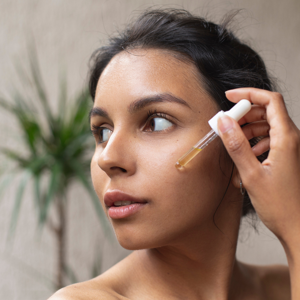 A woman with radiant skin after applying anti-ageing serum